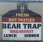 Sign displaying fresh hot pasties, breakfast, lunch, dinner