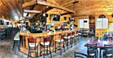 Inside view of dining area and beautiful bar